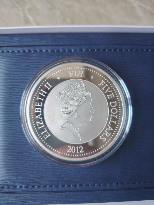 Инвестиционни монети сребърна монета с частично позлатяване 24 карата