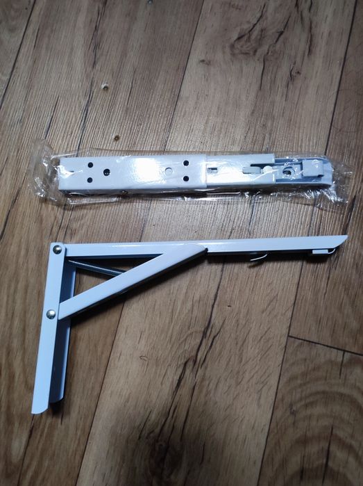 2  стальных кронштейна новые  для складной полочки,белого цвета-24 см