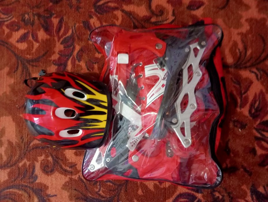 Роликовые коньки