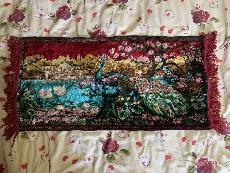 Carpetă veche cu păun