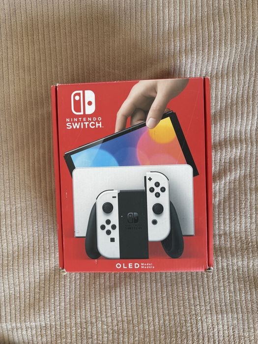 Nintendo Switch OLED + 2 jocuri