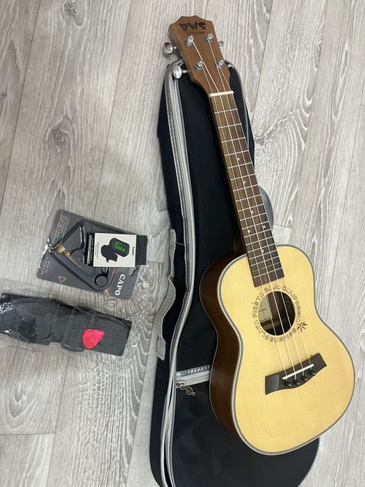 Продам Укулеле почти новый