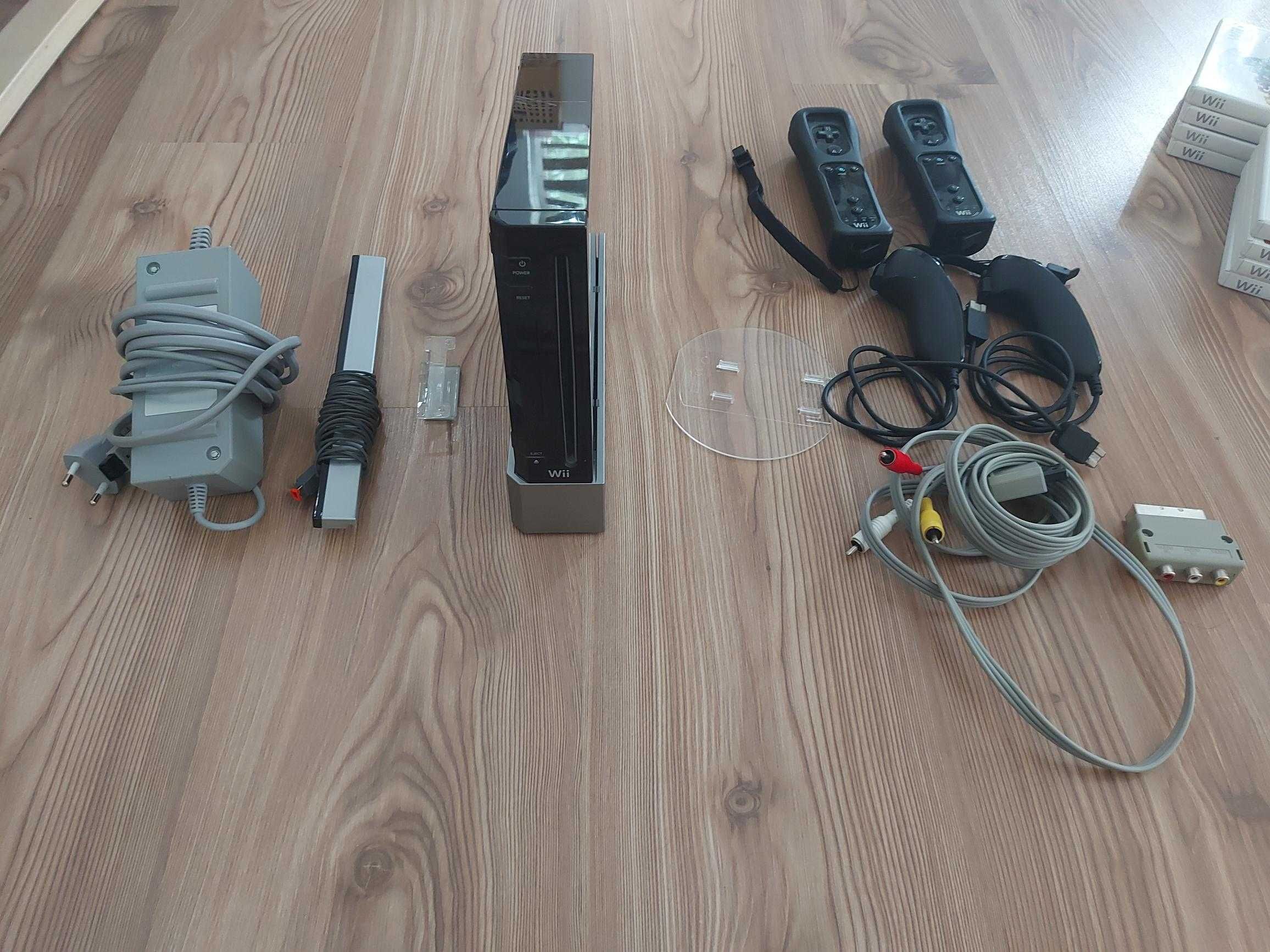 Pachet Nintendo Wii: consolă, accesorii, jocuri, figurine