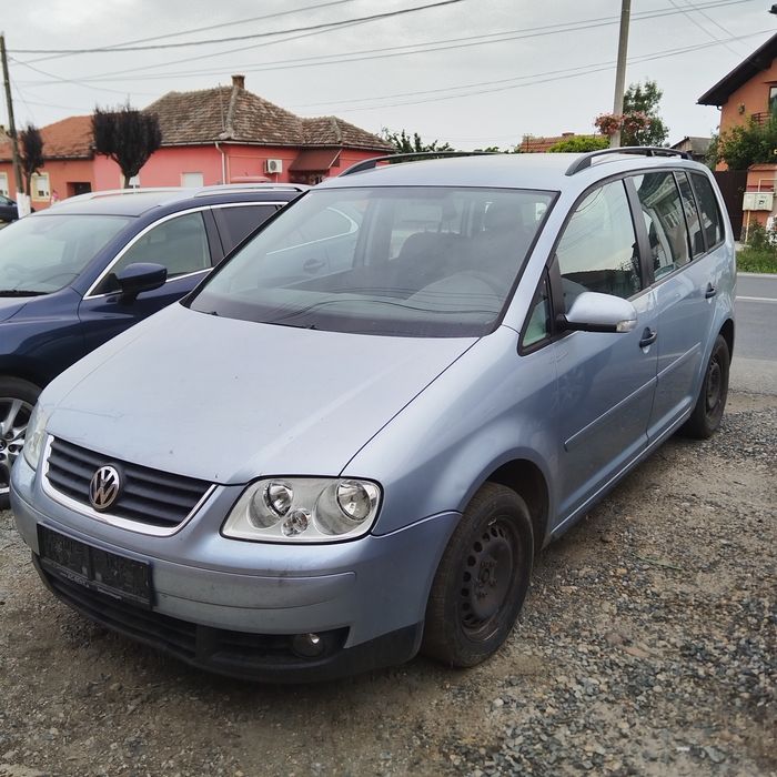 Aripa stanga Vw Touran an 2003-2008