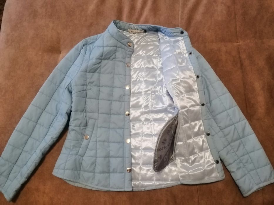 Новые куртки с этикетками 42р