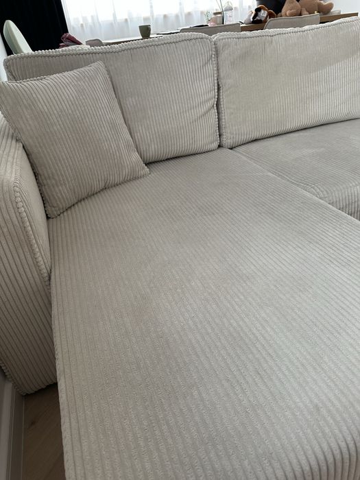 Canapea extensibila forma U model reiat