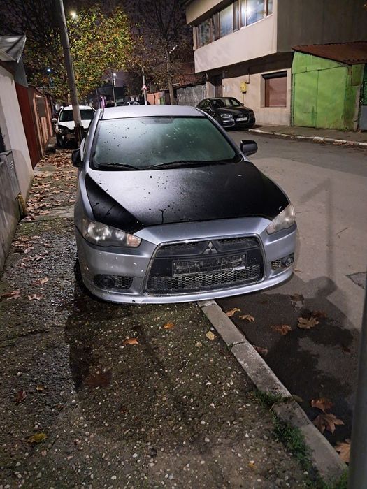 Dezmembrez Mitsubishi lancer benzina