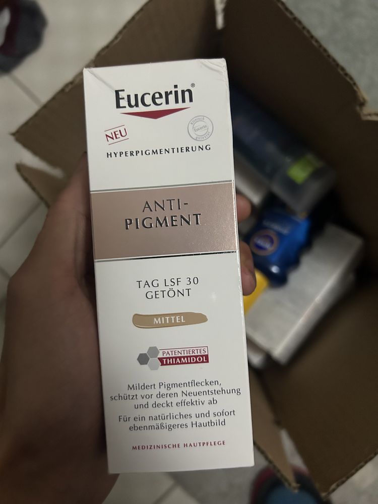 ЕУСЕРИН ANTI-PIGMENT MITTEL оцветен дневен крем, тъмен цвят