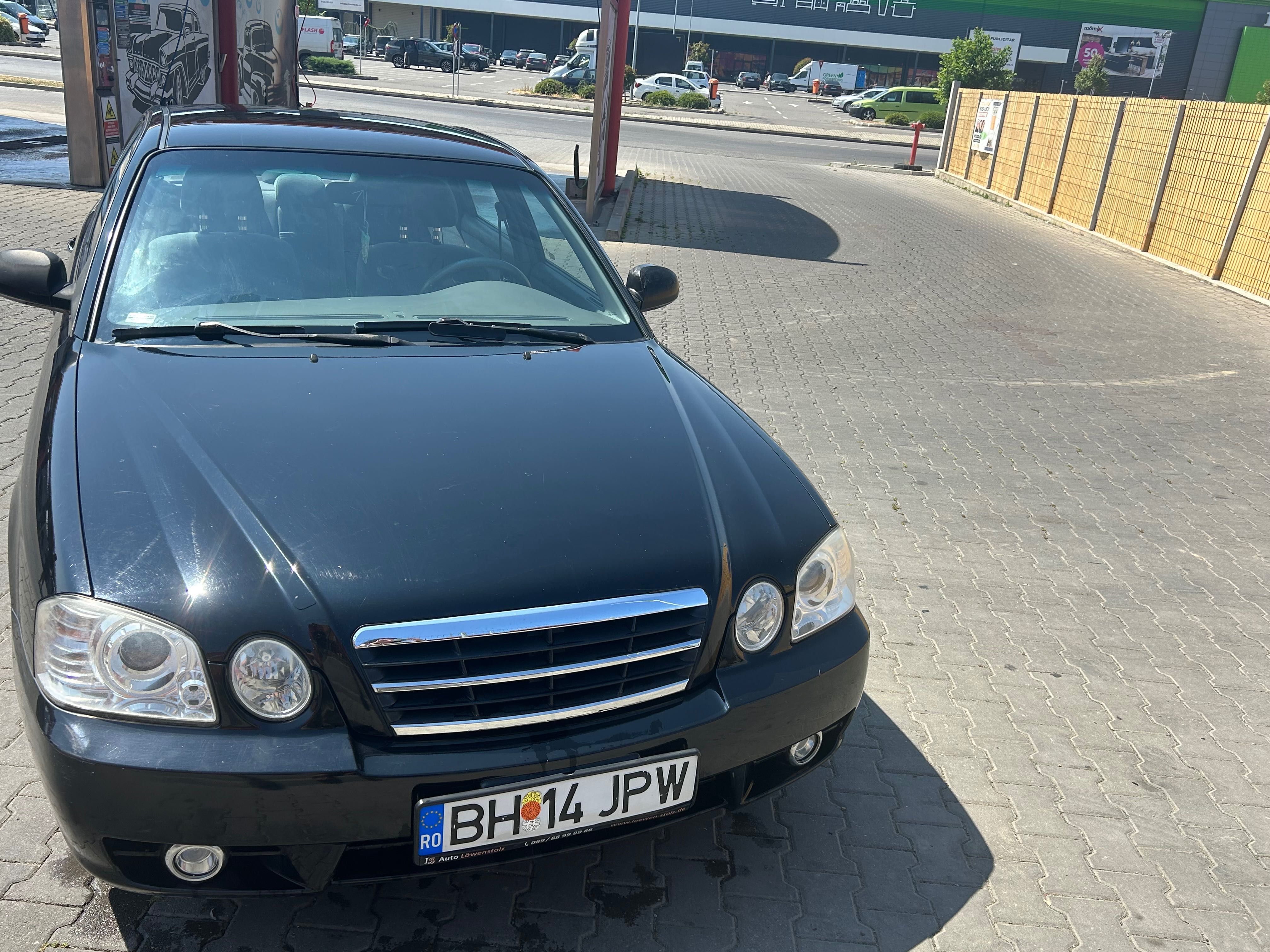 AutoKia Magentis
