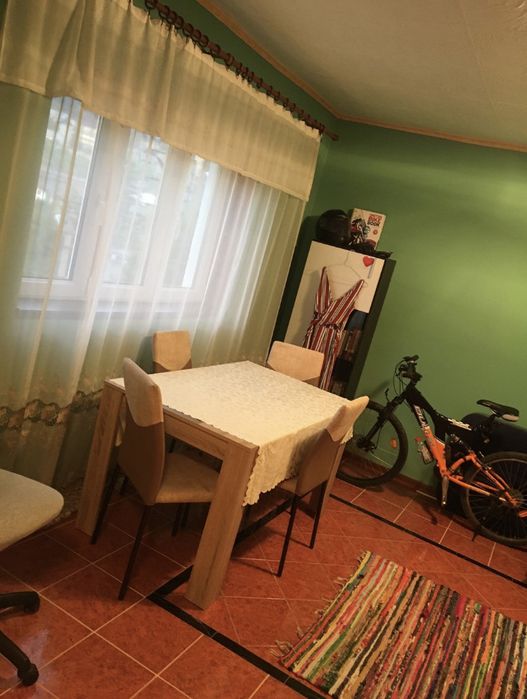 Apartament cu doua camere si dependinta pentru lemne, in curte