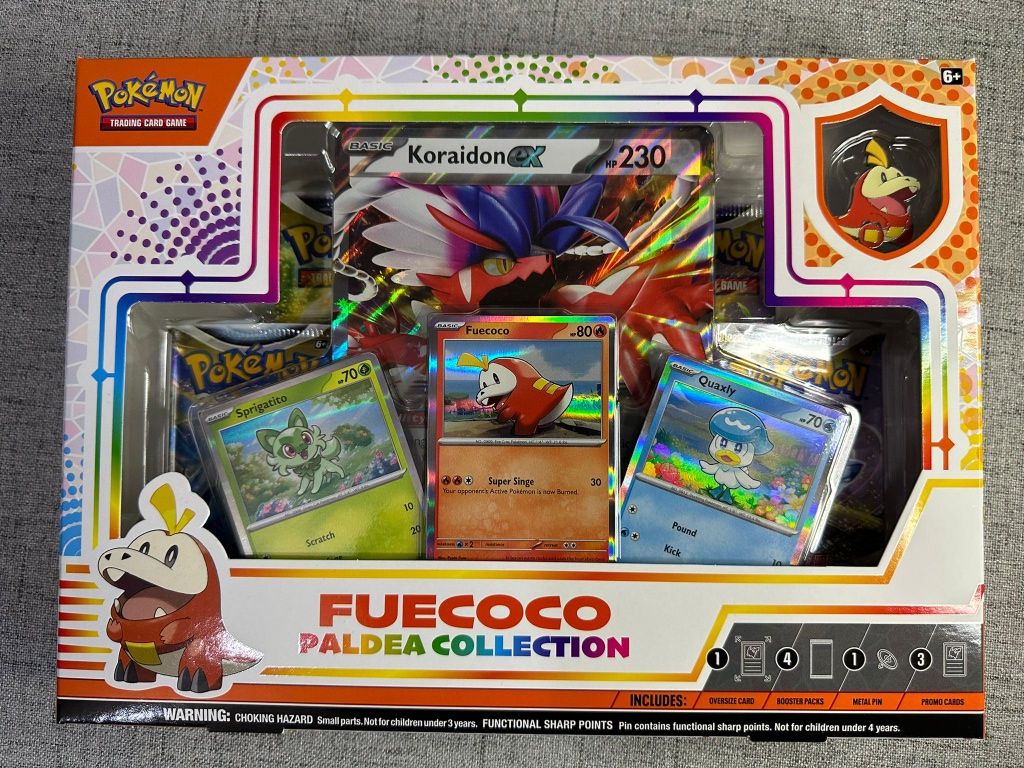 Pokemon Fuecoco Paldea Collection, Koraidon- original și sigilat