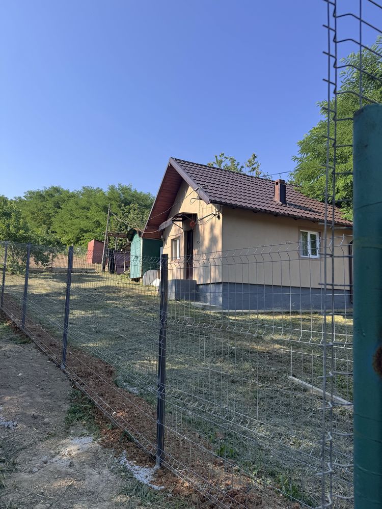 Vand teren + casuta vacanta