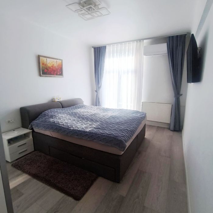 Apartament 2 camere + cameră 16 mp demisol + parcare – Central Oradea