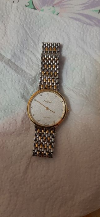 Продавам Масивен тънък часовник omega Работещо/внос от Швеция