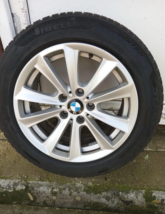 Jante originale + cauciucuri aproape noi de iarna BMW seria 5 f10