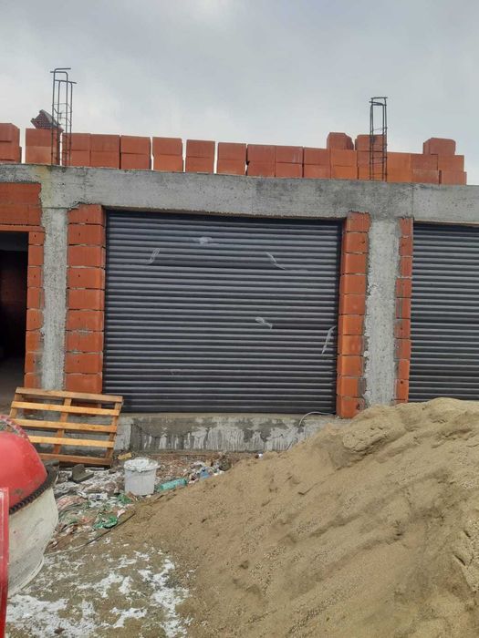 Rulouri tip usi, cu lamela 55,77 pentru garaje.