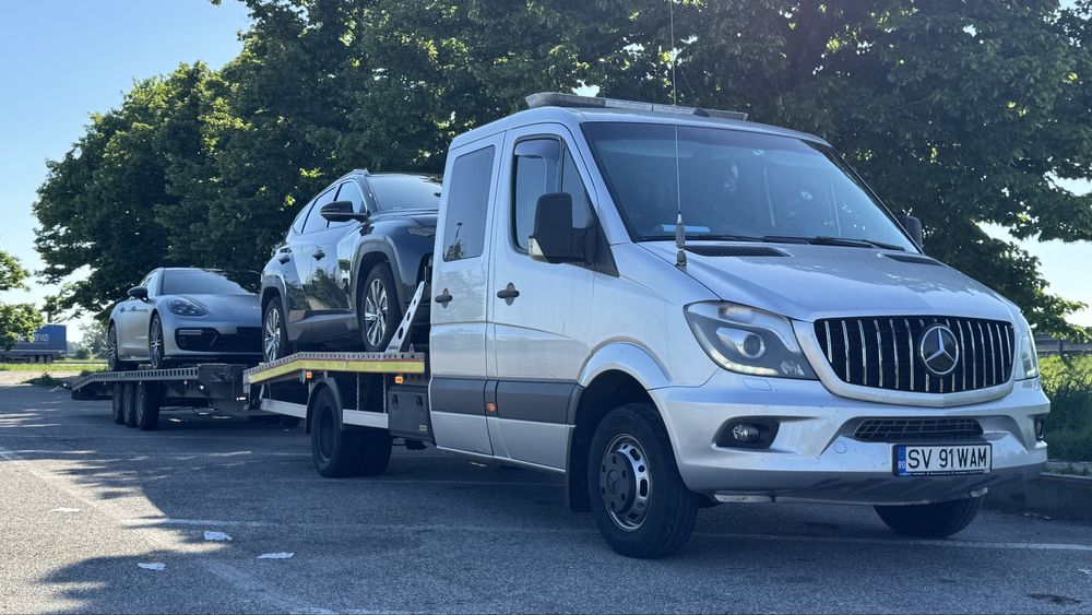 Transport auto pe platformă România-Italia și Italia-România