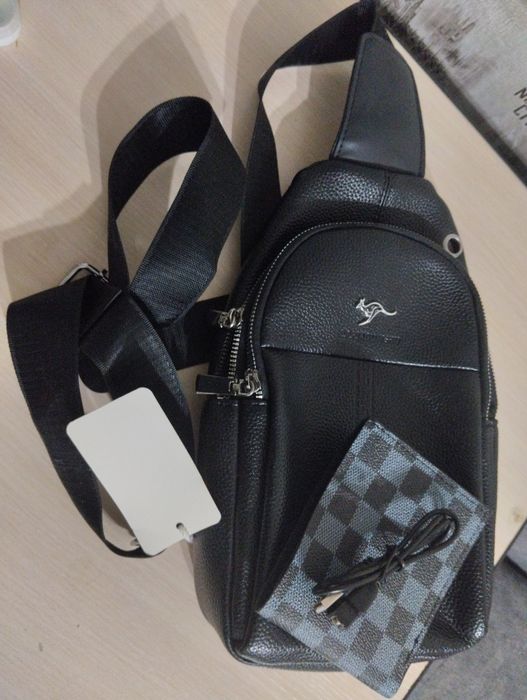 Продам барсетку мужскую