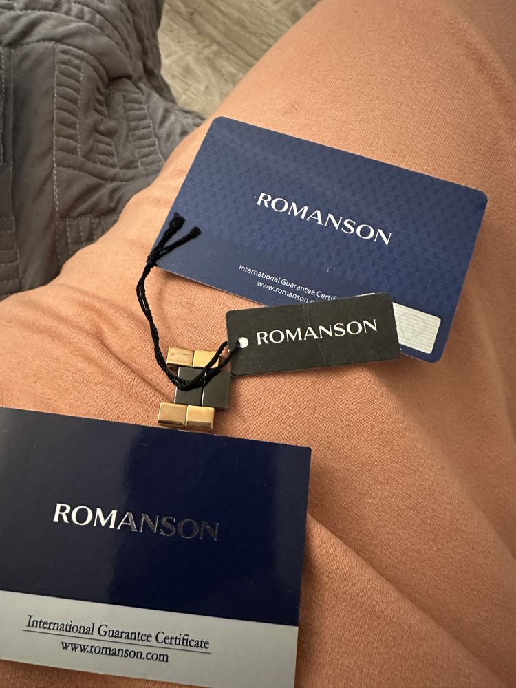 Часы Romanson
