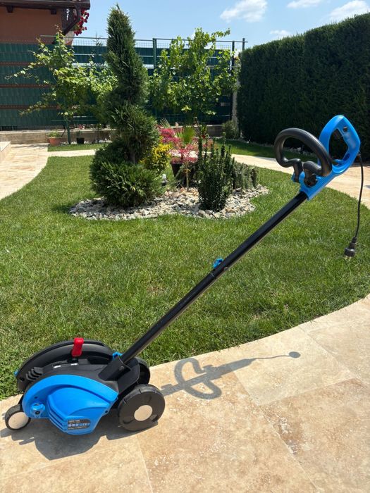 Trimmer / aparat pentru tuns marginea gazonului