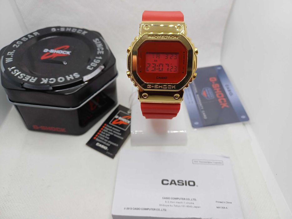 Ceas Casio g shock gm 5600cx Metal Gold-red Nou,Garantie 2 ANI