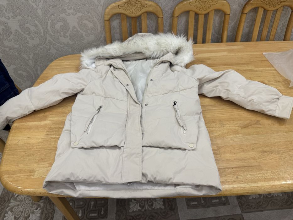 Пуховик женский в отличном состоянии