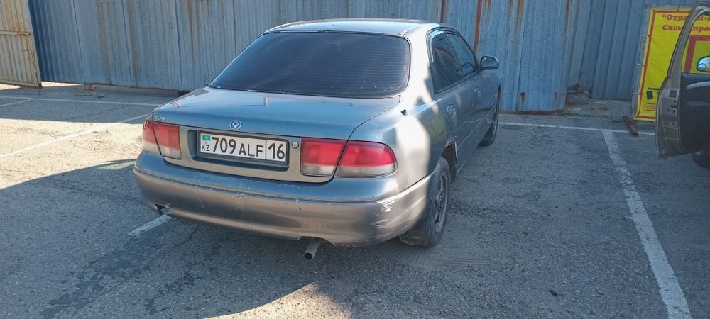 Мазда кронус 92..
