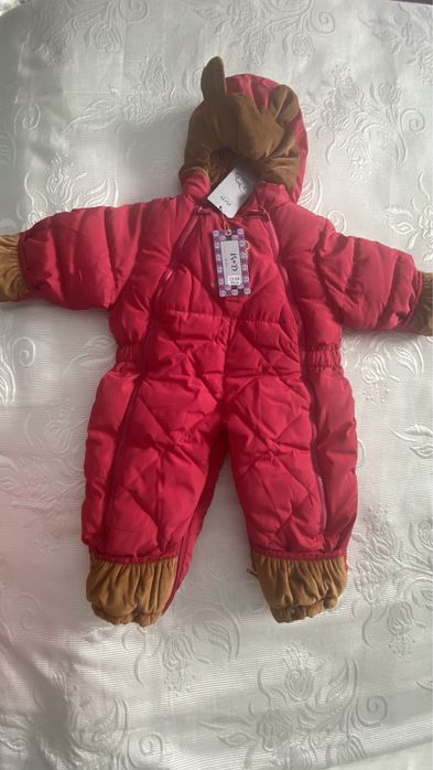 Продам детский комбинезон новый