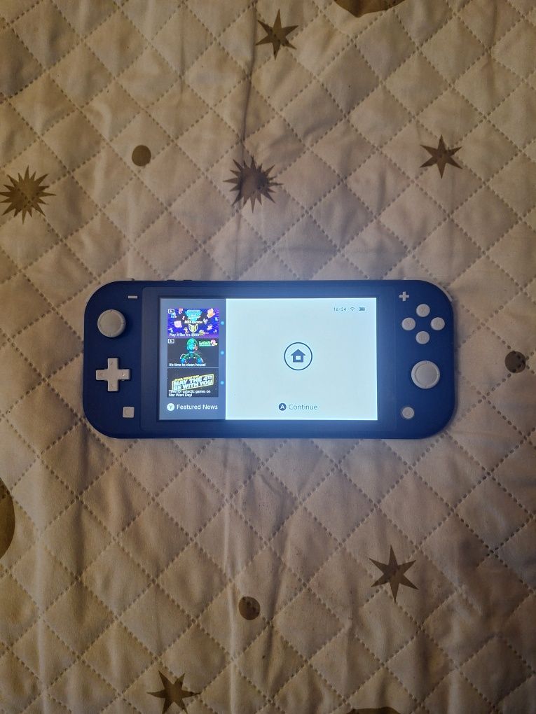 Vând nitendo switch lite