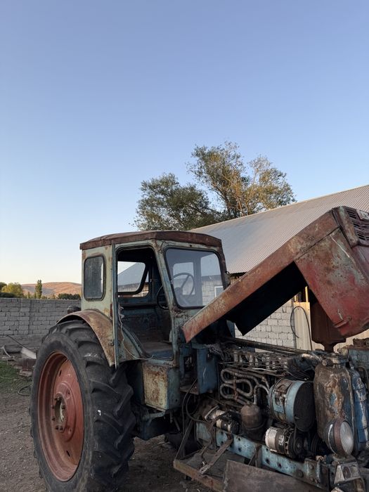 Трактор т40 тырмасымен бірге