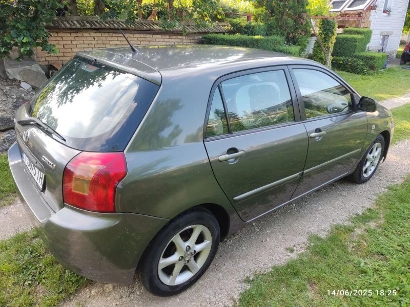 Тойота Corolla 2003