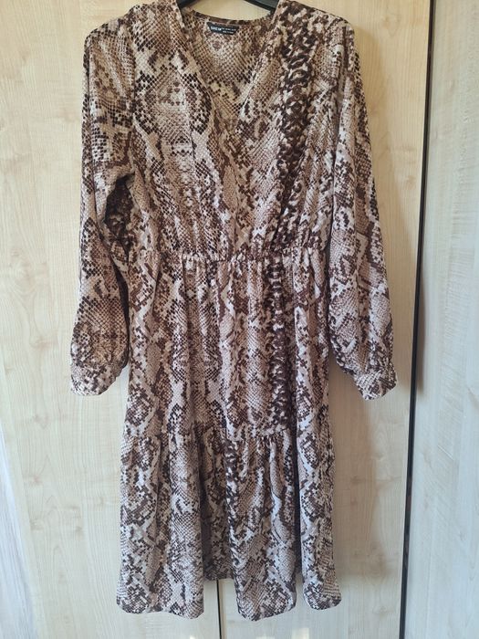 Актуална рокля със животински принт