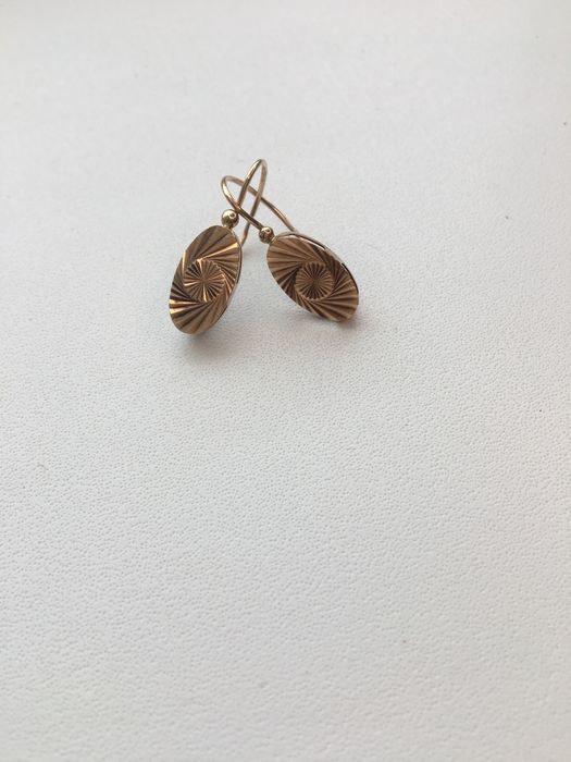 Продам золотые серьги