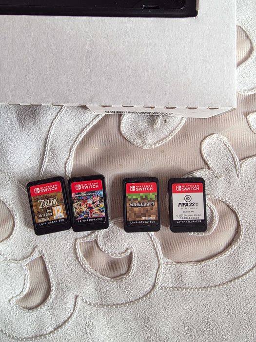 Vand Nintendo Switch + husa + 4 jocuri