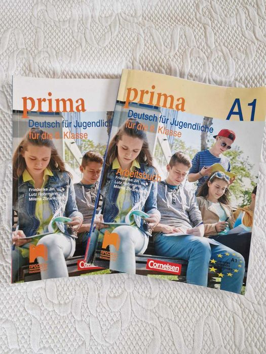 Учебник + тетрадка Prima A1 по немски