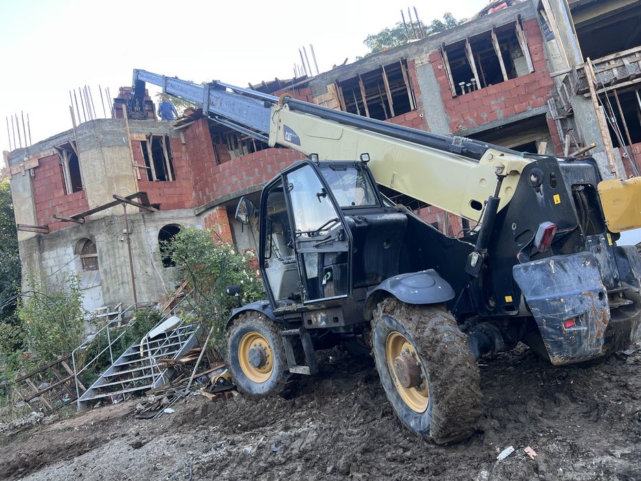 Vand caterpillar telehandler 417C ( manitou) cu brat de 17 metri
