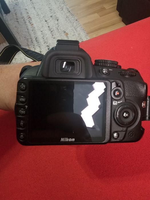 Nikon D3100 + 18-55mm