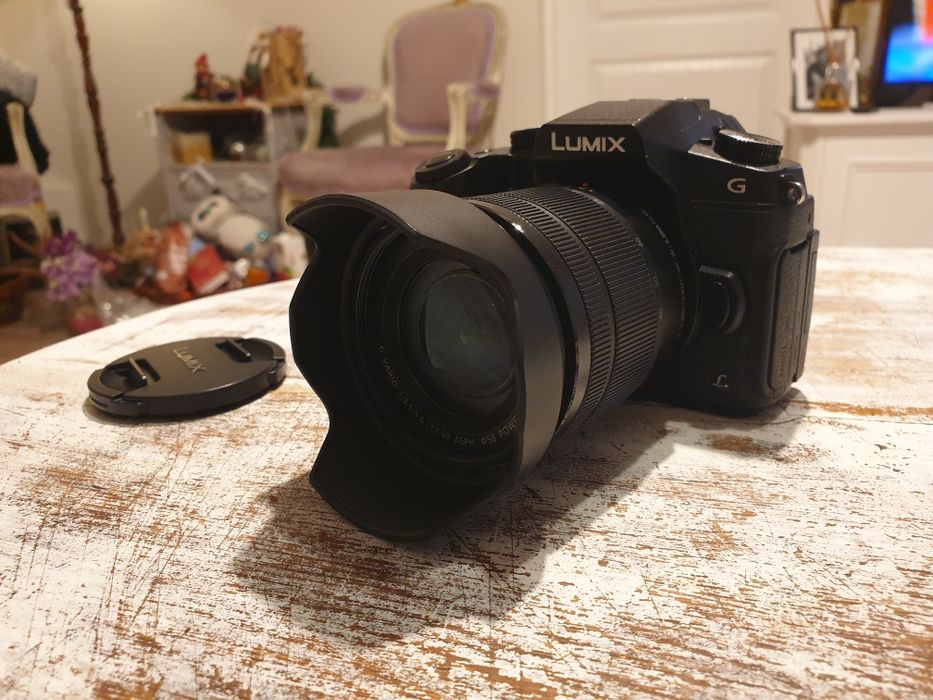 Panasonic 12-60 aproape ca nou