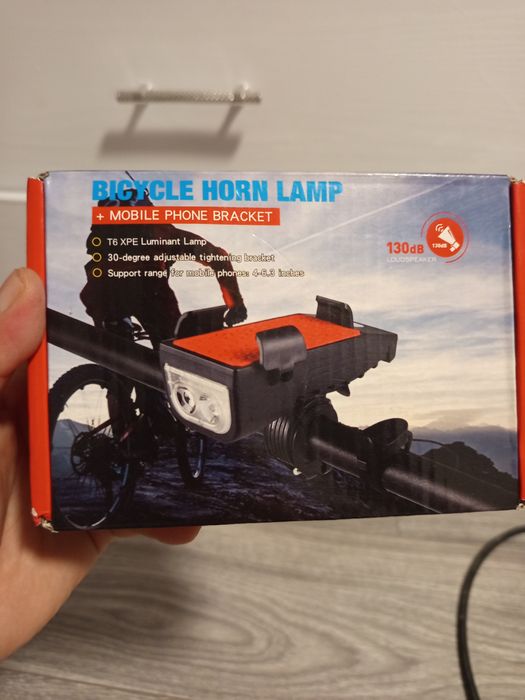 Lampă multifuncțională pentru bicicletă cu claxon și suport de telefon