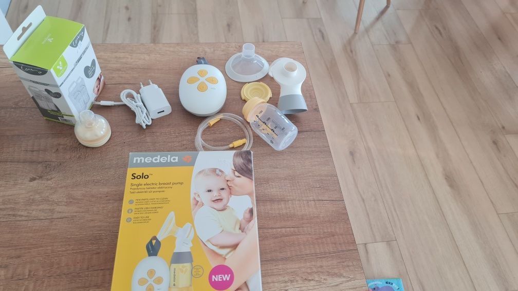Електрическа помпа за кърма Medela + биберон Калма + пликове за кърма