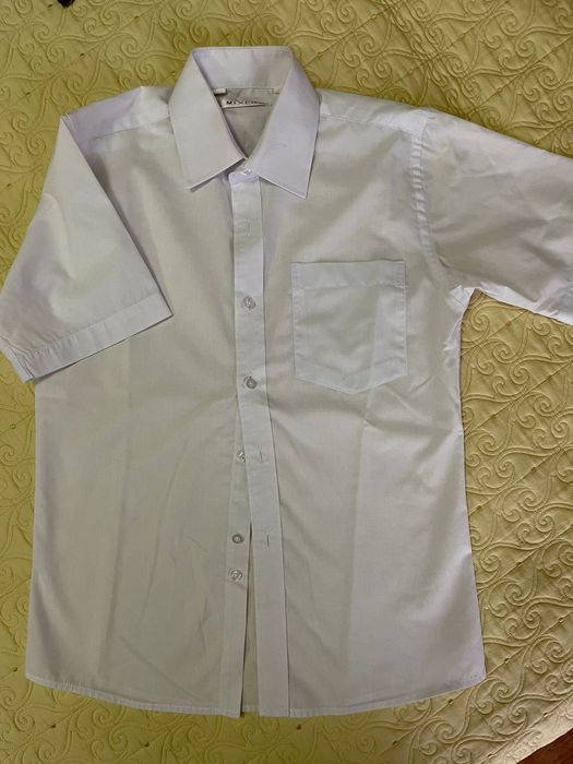 Продам школьную рубашку , в отличном состоянии, размер 10-12 лет