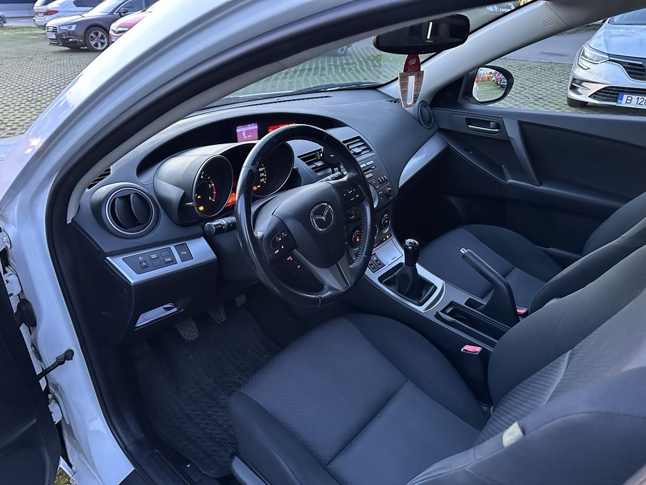 Mazda 3, 1.6 bl , motorina, 2009 consum 4,5l/100km