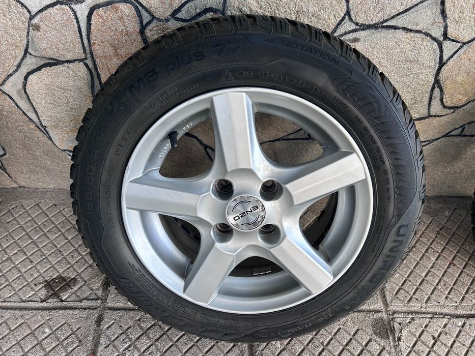 зимен комплект гуми  185/60/14 /6jx14h2. Без кривини по джантите.