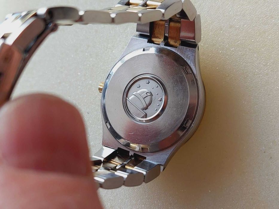 Омега,Omega Constellation,злато-стомана-електромеханичен часовник 70г.