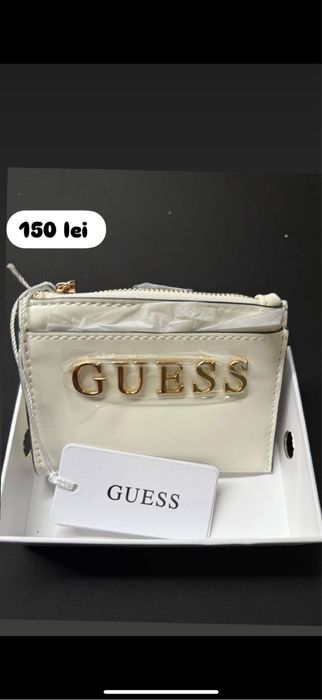 Lot genti si portofele Guess