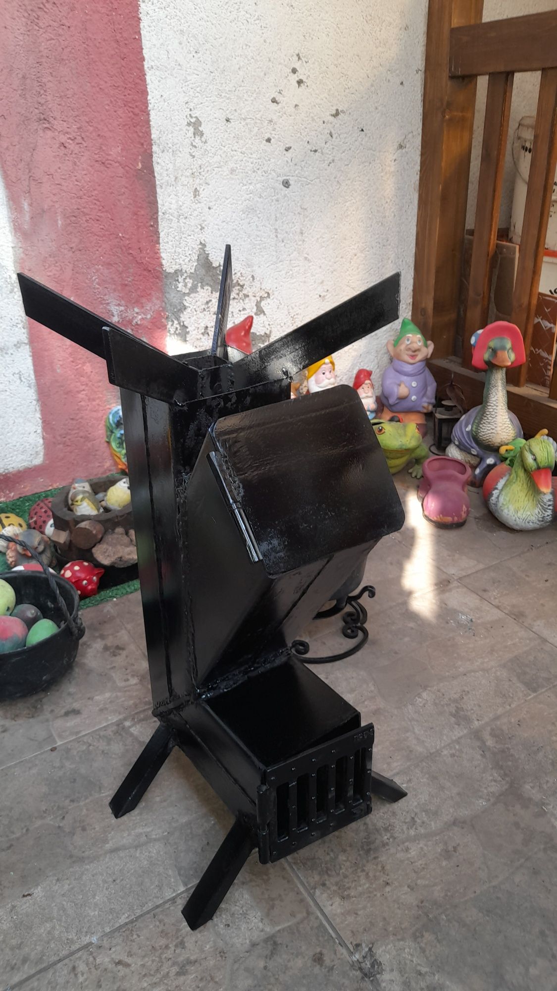 Sobă racheta pentru gatit la foc