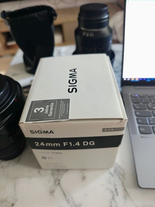 Sigma 24mm f1.4 canon sau 16-35mm f2.8 canon ef