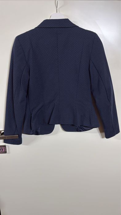 Costum Novatex nou fara eticheta