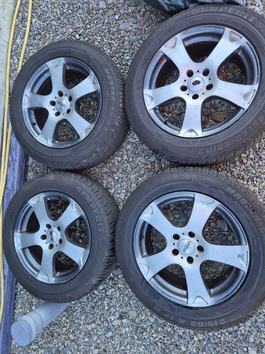 Vând jante+cauciucuri de Wv Tiguan 215/65/17 M+S 5/112/17