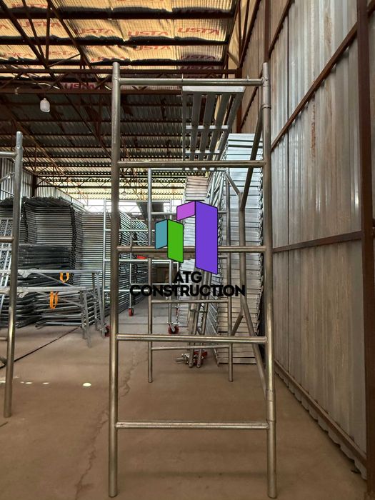 Строительные леса складные оцинкованные комплект с настилом и колесами